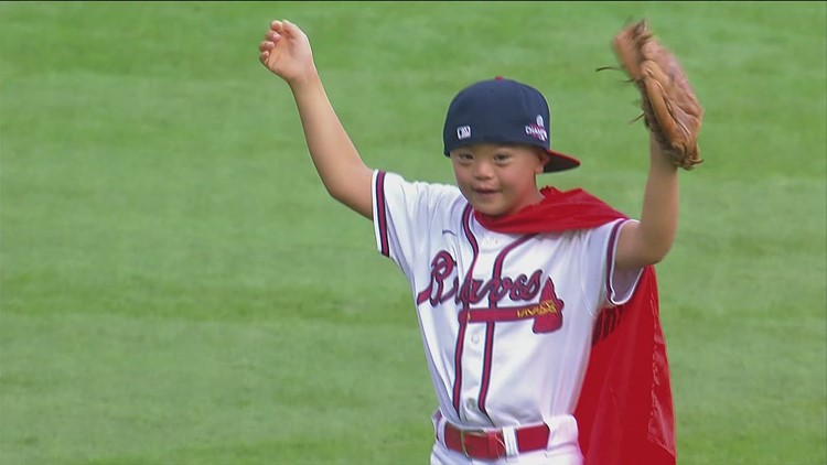 Boy throws out first pitch for the Braves makes a play to find other foster kids a family