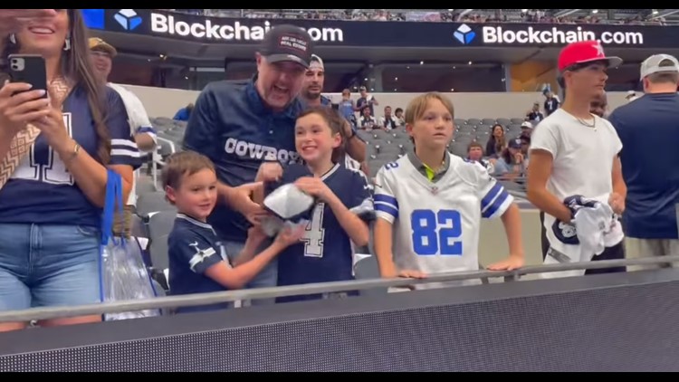 Cowboys QB Dak Prescott makes 7 year old kids day by tossing him his hat