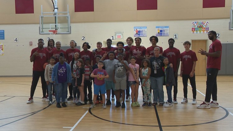 Gamecock mens basketball team headlines a kids clinic at Cayce Elementary School