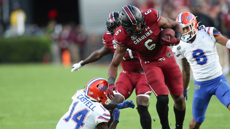 Mertzs 3 TDs career day rallies Florida to 41 39 victory over South Carolina