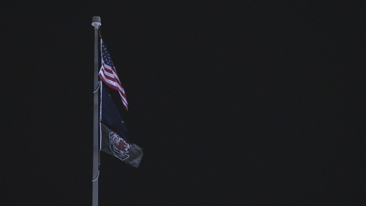 Gamecock flag flying atop the State House to celebrate national title