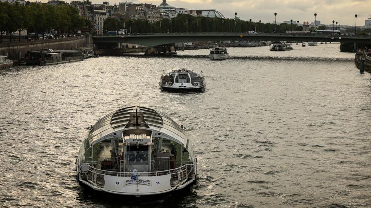 Boats cruise the Seine river in Paris Olympics Opening Ceremony rehearsal