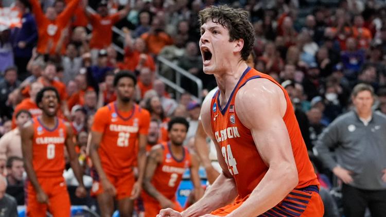 Former Clemson center P.J. Hall signs as an undrafted free agent with the Denver Nuggets