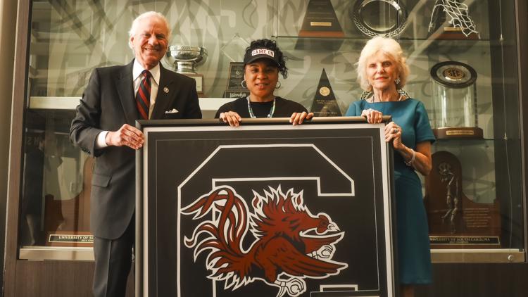 Dawn Staley given Gamecocks flag that flew over the State House