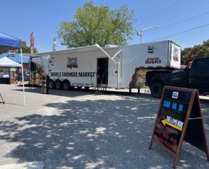 Toms Creek Family Farms goes mobile dogs find homes at Steel Hands Brewing