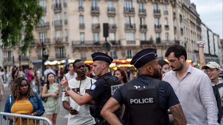 Barriers around the Eiffel Tower cyberattacks and more Heres what security looks like at the Olympics