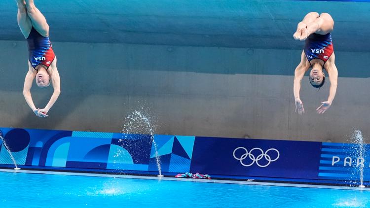 Why do they spray water on pools during Olympic diving events