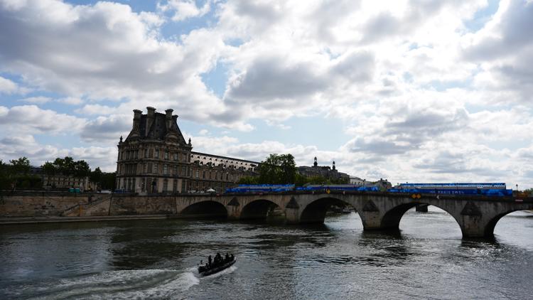 It might rain during the Paris Olympics ambitious Opening Ceremony on the Seine River