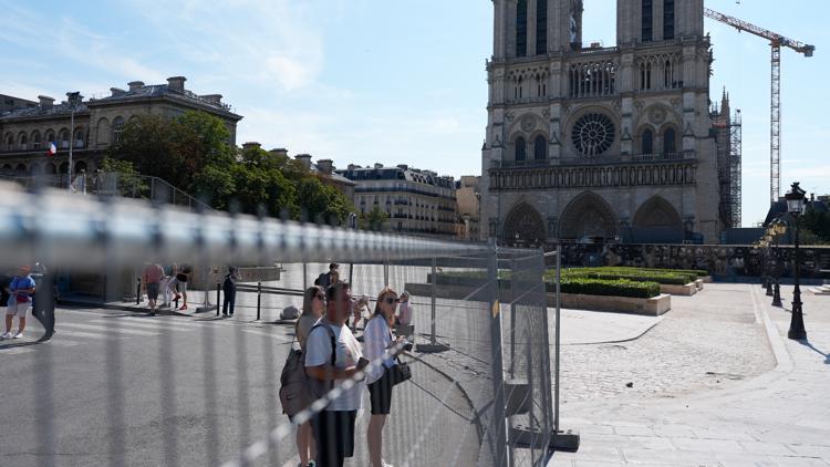 Paris police are sealing off the Seine River ahead of the Olympics Opening Ceremony