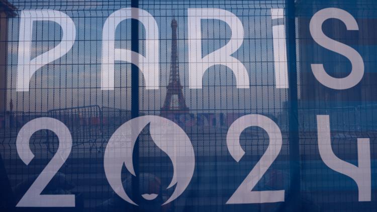 Paris Olympics off to rough start with sabotaged trains and weather dampening mood before opening