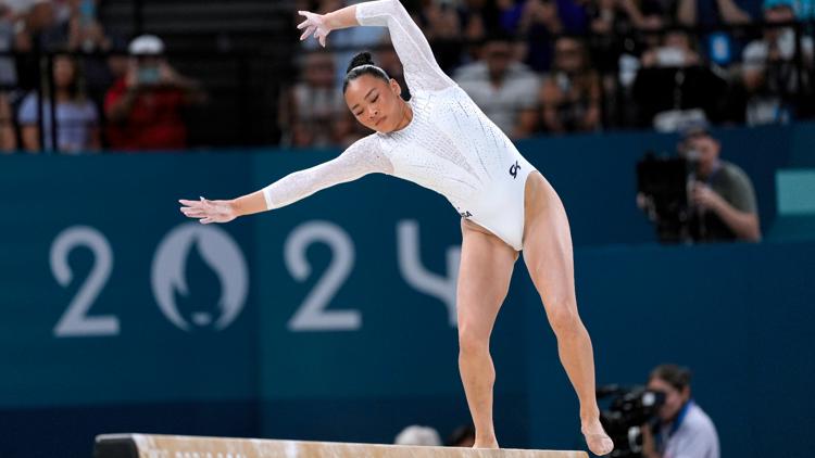 It was unusually quiet at the Olympics balance beam final and Suni Lee says the gymnasts noticed