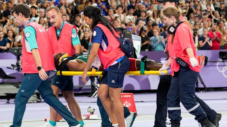 Mens steeplechase final Ethiopian world record holder takes hard fall carried away on a stretcher