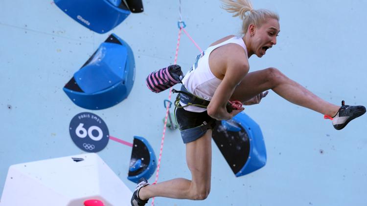 Janja Garnbret overcomes American Brooke Raboutou to defend Olympic gold medal in sport climbing