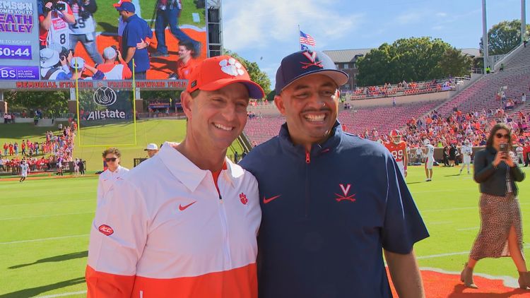 Clemson defeats Virginia 48 31 on a day when former Tiger Tony Elliott returns to Death Valley