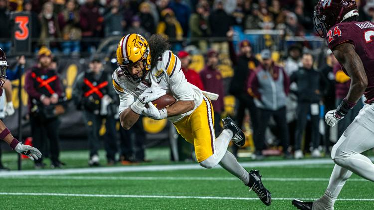 Dutch Fork product Elijah Spencer helps Minnesota defeat Virginai Tech to win the Duke’s Mayo Bowl in Charlotte