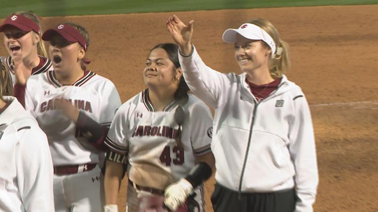 South Carolina softball opens the Ashley Chastain Woodard era with a five run rally in the seventh for a 7 6 walk off win over Virginia