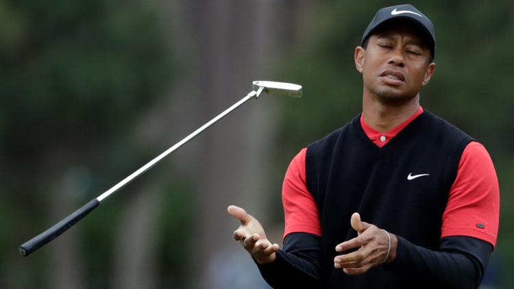 Tiger Woods says he ruptured his Achilles tendon, an injury likely to keep him out of the Masters