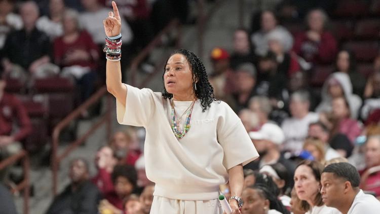 A handful of March Madness coaches stand out for their fashion choices amid a sea of casual attire