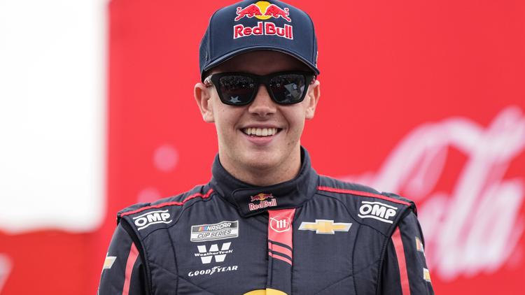 19 year old Mission 200 winner Connor Zilisch slips off car while celebrating win