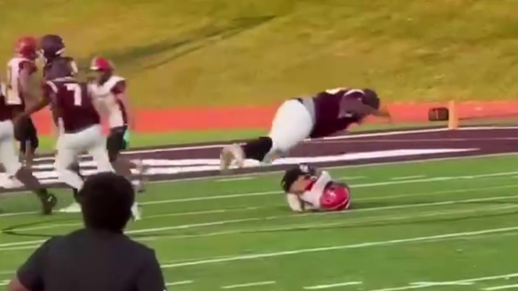 High school football player caught on camera jumping on top of opponent breaking spine
