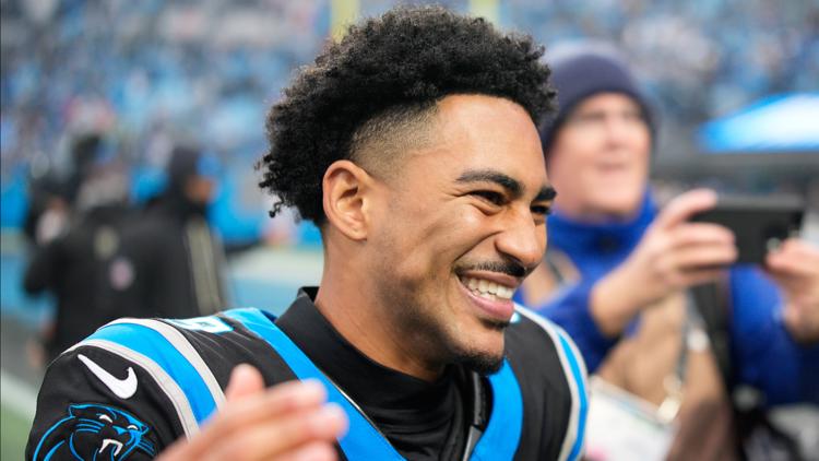 Young throws 3 TDs Panthers turn over Stafford 3 times to end Rams 6 game win streak 31 28