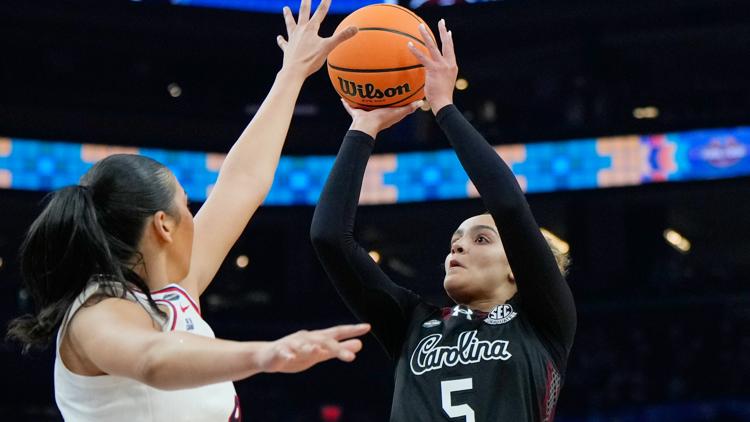 USC outmatches UConn 62 48 to advance to the national championship game