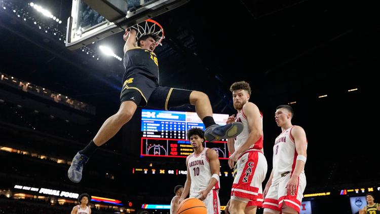 Michigan overpowers Arizona and reaches national title game with 91 73 win