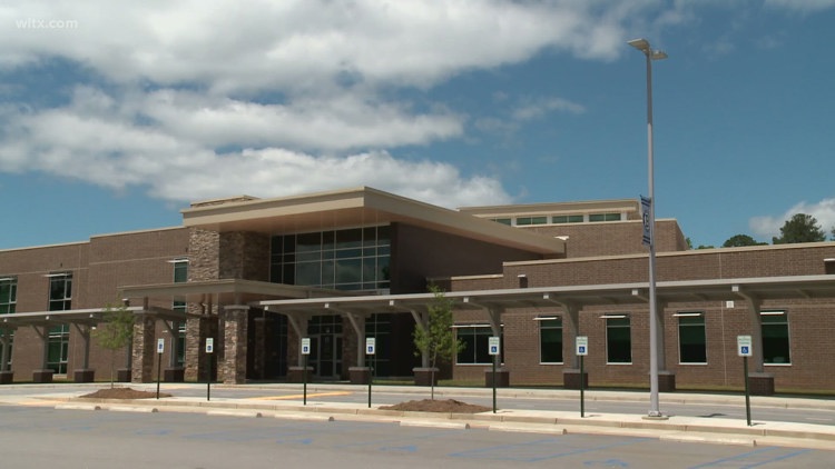 Lexington One details how parent accused of posing as officer brought gun into middle school