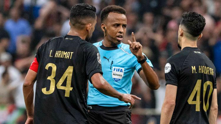 Somali World Cup referee denied entry to US arrives home to heros welcome