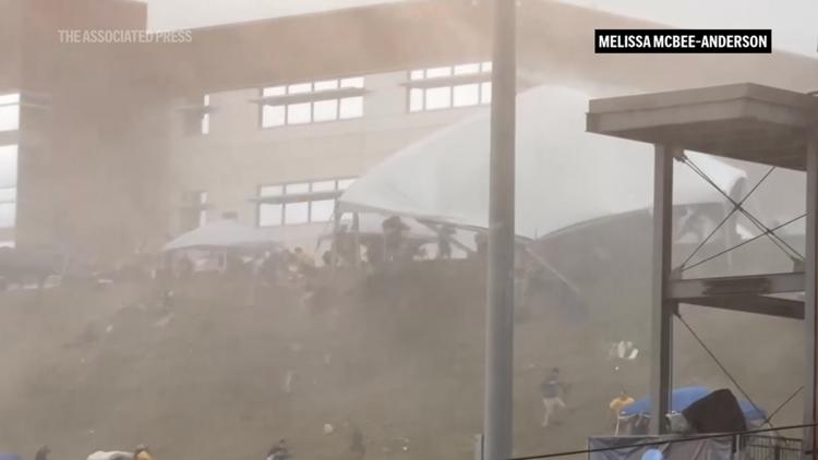 WATCH Strong wind at NCAA baseball tournament in West Virginia sends 5 people to the hospital