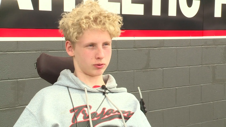 Paralyzed Ohio student stays close to football as team captain one year after injury