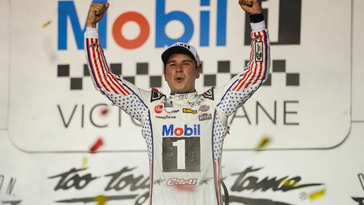 Bell passes defending NASCAR champion Larson to win the Southern 500 to start the Chase
